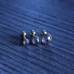 16g triple forward helix gold and clear jewelry