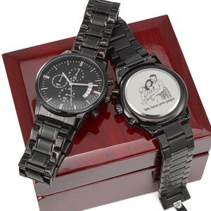 Custom photo laser engraved wooden wristwatch with a personalized family picture on the back dial, luxury leather strap close-up shot.
