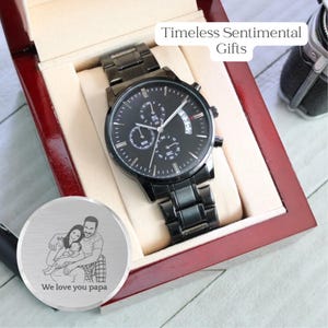 Custom photo laser engraved wooden wristwatch with a personalized family picture on the back dial, luxury leather strap close-up shot.