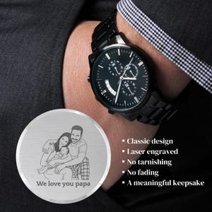 Custom photo laser engraved wooden wristwatch with a personalized family picture on the back dial, luxury leather strap close-up shot.