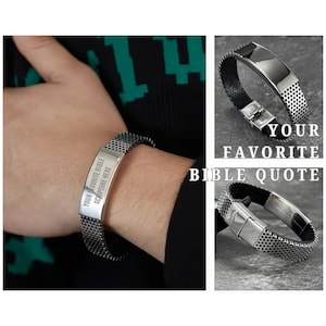 May include: A silver bracelet with a black mesh band and a rectangular plate that says "Your Favorite Bible Scripture Here".
