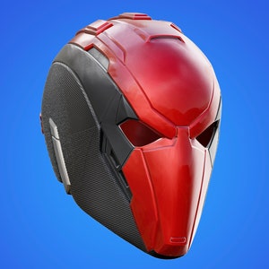 以下が含まれることがあります： 未来的なデザインの赤と黒のヘルメット。ヘルメットにはバイザーとテクスチャ加工された表面があります。