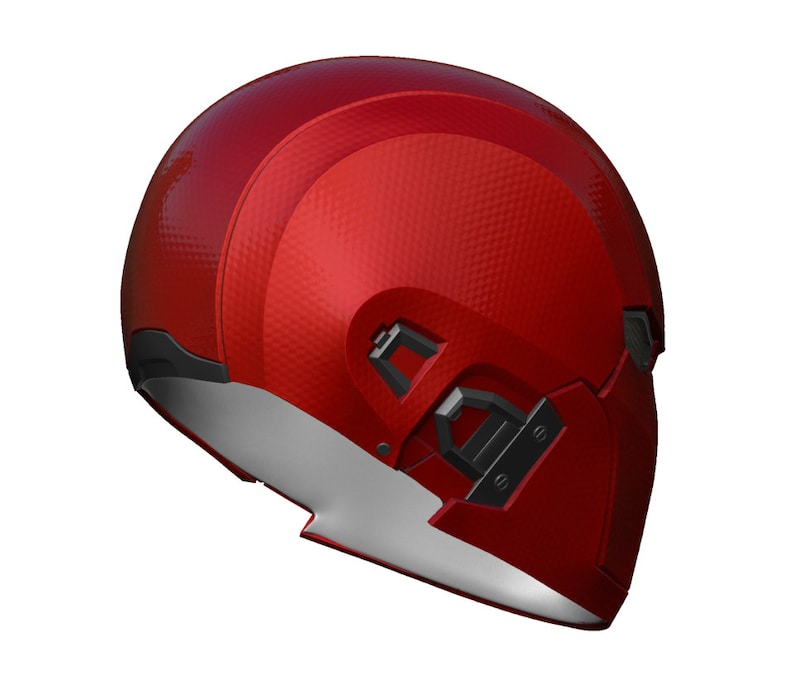 May include: A red helmet with a textured surface and black accents. The helmet has a visor and a chin strap.