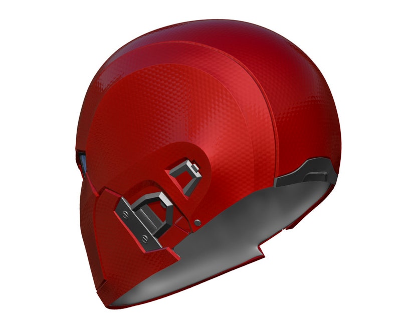 May include: A red helmet with a textured surface and a black visor. The helmet has a black strap and a black buckle.