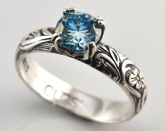 Anello in moissanite blu mare fatto a mano in argento sterling, pietra preziosa blu acquamarina sfaccettata su fascia con motivo floreale e fogliare, regalo elegante per lei