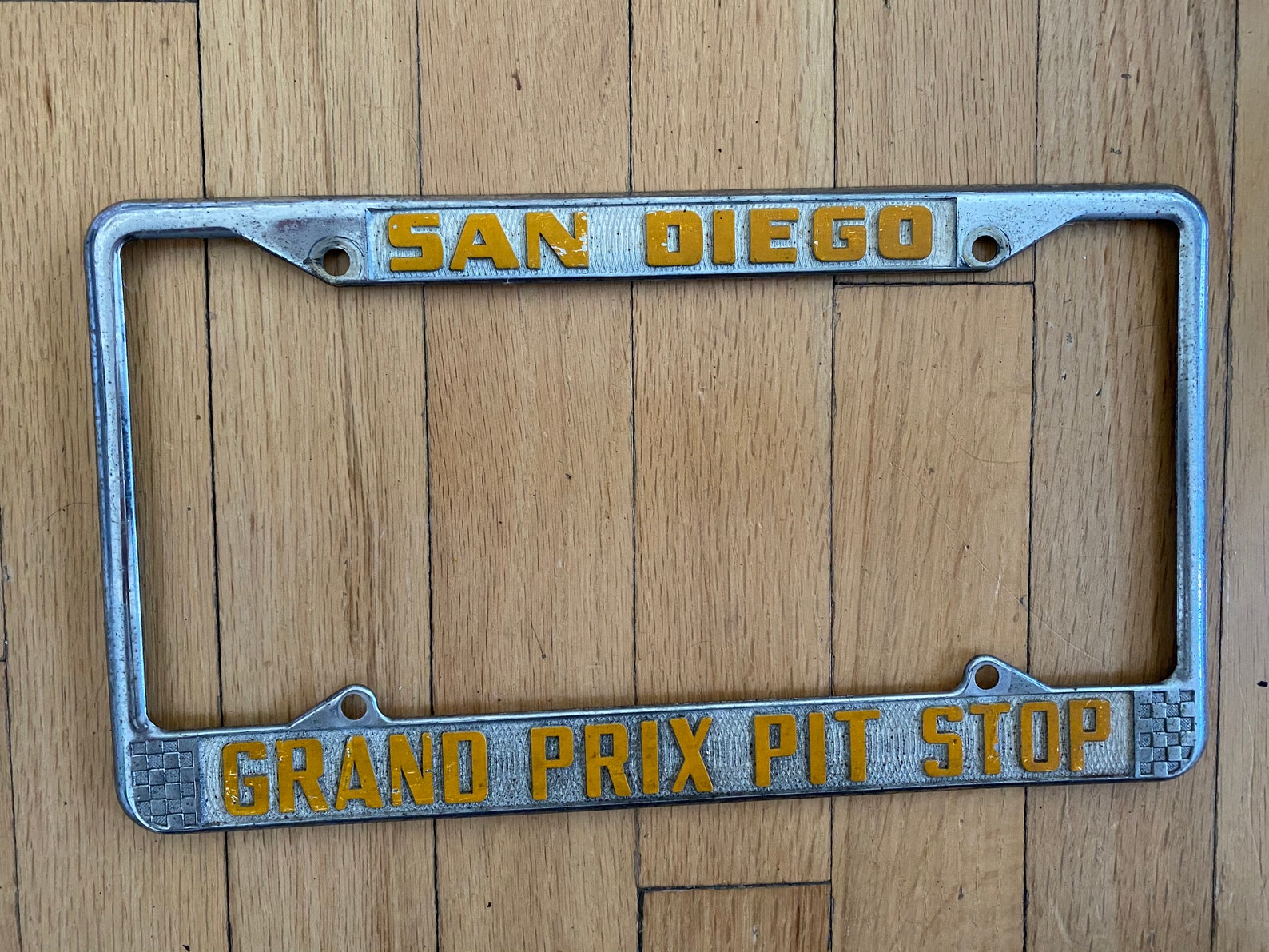 Vintage car dealer license plate frame from San Diego Etsy
