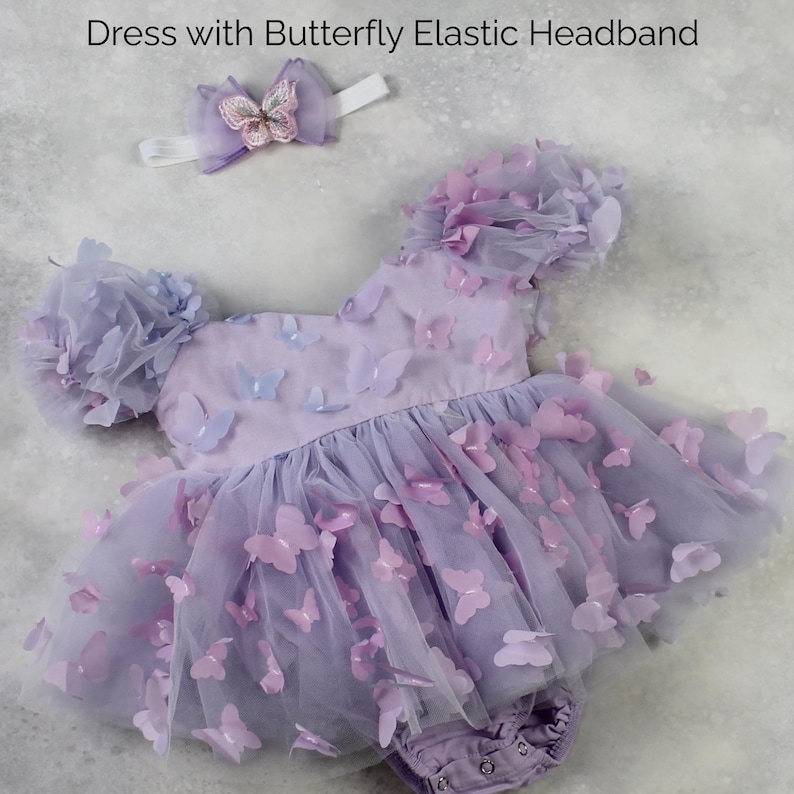 First birthday baby girl lavender butterfly dress with puffy short sleeves and built in romper/ bodysuit dress.