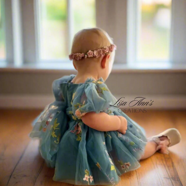 Celebrate your little one's first birthday with a touch of elegance and style! Discover the stunning Dusty Blue First Birthday Floral Dress that is perfect for making those precious milestone memories extra special. With its intricate floral print, comfortable fit, and timeless elegance, this dress is a true keepsake for you and your baby.