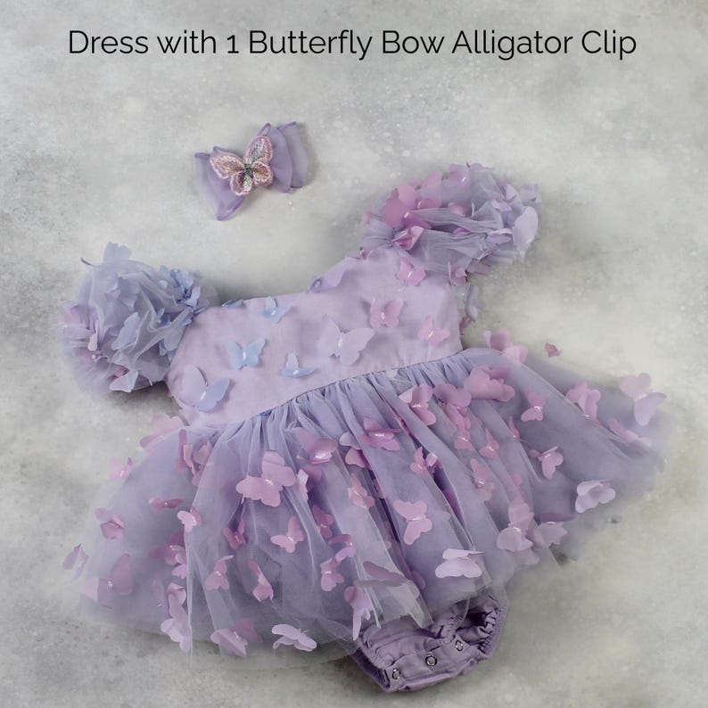 First birthday baby girl lavender butterfly dress with puffy short sleeves and built in romper/ bodysuit dress.