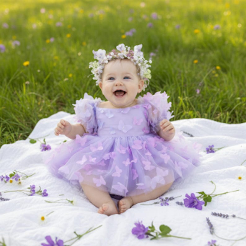 First birthday baby girl lavender butterfly dress with puffy short sleeves and built in romper/ bodysuit dress.