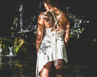 Top corto blanco sin espalda: Top sin mangas estilo boho para festivales