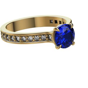 18 Karat Yellow Gold Blue Sapphire Cartier Inspired Ring