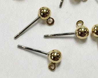 May include: A close-up of ten gold earring findings with a small ball at the end of each post. The findings are on a white surface.