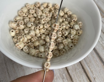 Howlite Stone mini skull beads, skull charms, mini howlite skull heads