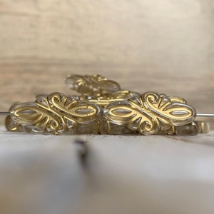 Boho guldfärgade akrylglaspärlor, klara utsmyckade ovala pärlor, transparenta guldpläterade distanspärlor, smyckestillverkningstillbehör, 30 mm, set om 12