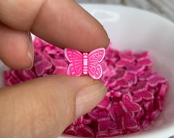 Carved acrylic hot pink butterfly spacer beads 11x14mm (20)