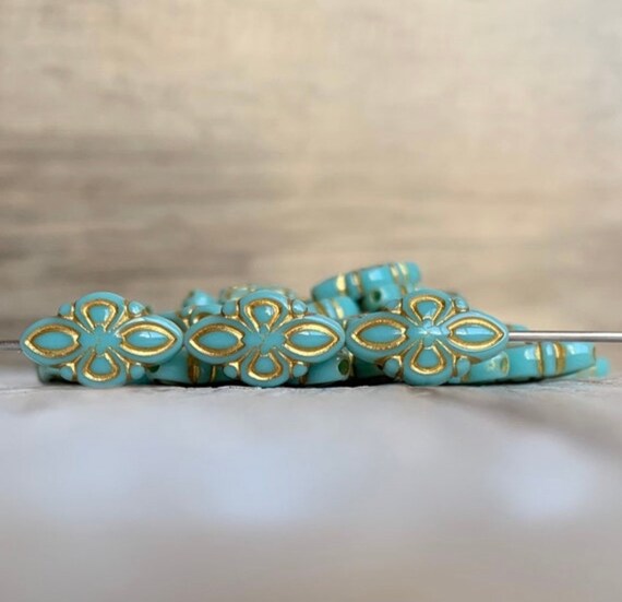 Flat oval beads engraved in turquoise and gold made of acrylic, 16 mm (16)