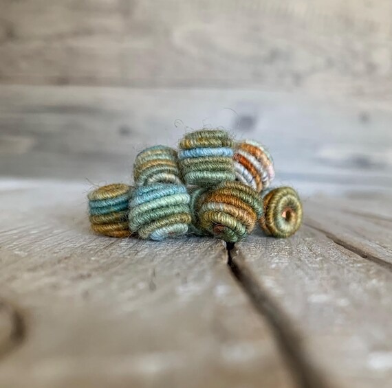 Small handmade fabric textile beads for handmade jewelry designs