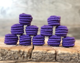 small handmade fabric textile fabric bead for handmade jewelry designs, in purple