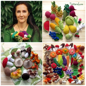 May include: A collection of crocheted fruits, vegetables, and mushrooms. The crocheted items are arranged on a wooden surface and a green fabric surface. The crocheted items include a pineapple, watermelon, grapes, corn, pear, mushrooms, carrots, and a variety of other fruits and vegetables.
