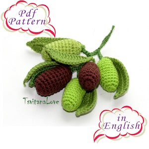 May include: Crochet olive branch pattern in PDF format. The pattern includes instructions for crocheting green leaves and brown olives. The pattern is available in English.