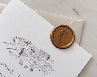 May include: A wedding invitation suite featuring a detailed architectural illustration in black ink. The invitation is sealed with a gold wax seal with an olive branch design. The suite includes a white card, a cream envelope, and a marble background.
