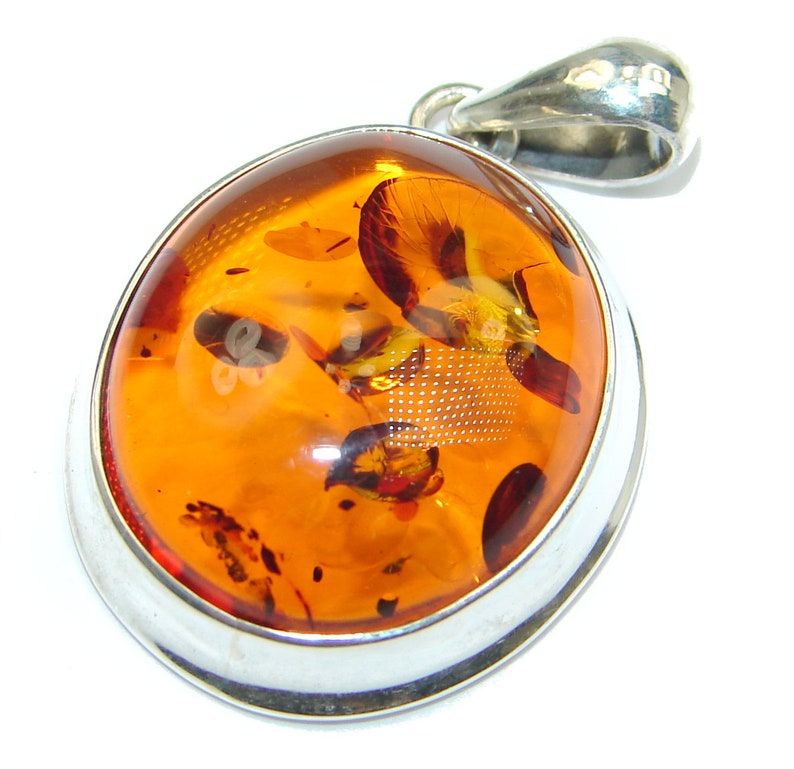 weight 7.50g Amber Sterling Silver Pendant code 17-sty-19-22 W- 1 T- 1 4 inch dim L- 1 5 8
