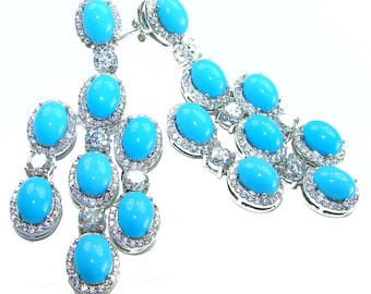 Pendientes de turquesa de la Bella Durmiente en oro blanco de 18 quilates sobre plata de ley, piedra preciosa azul ovalada, joyería única hecha a mano.
