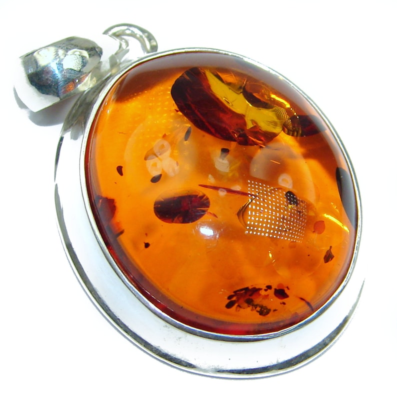 weight 7.50g Amber Sterling Silver Pendant code 17-sty-19-22 W- 1 T- 1 4 inch dim L- 1 5 8