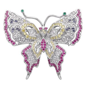 May include: A silver-toned butterfly brooch featuring an intricate openwork design. The wings are embellished with pavé-set clear, yellow, and pink stones, with small dark blue accents and two green stones at the tips of the antennae.