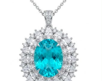 Collar de plata de ley con turmalina Paraiba, gema azul de talla ovalada única, joyería artesanal llamativa.