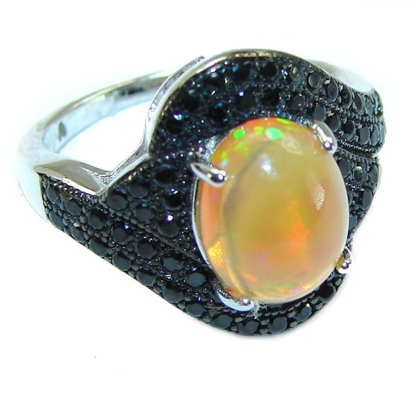 Revolution Genuine  4.5 carat Ethiopian Opal 18K Gold over.925 Sterling Silver handmade Ring size 7 1/2