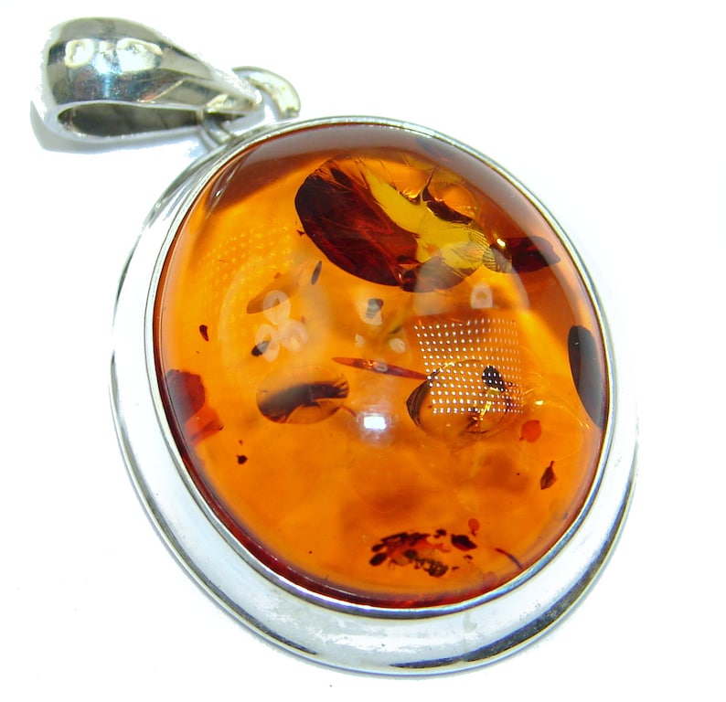 weight 7.50g Amber Sterling Silver Pendant code 17-sty-19-22 W- 1 T- 1 4 inch dim L- 1 5 8