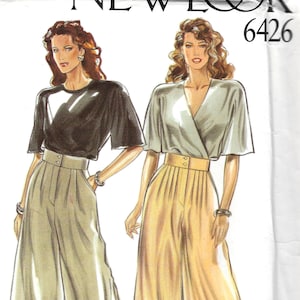 May include: A sewing pattern for a women's top and pants. The top has a wrap style and the pants are wide-legged with a high waist. The pattern number is 6426.
