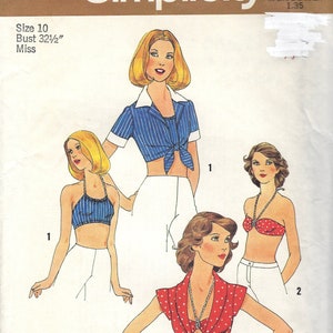 May include: A sewing pattern for a cropped top with a tie front. The pattern includes four different styles of tops, all with a cropped length. The pattern is for size 10, with a bust measurement of 32 1/2 inches.