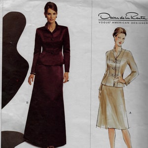 May include: A sewing pattern for a two-piece outfit. The pattern includes a long skirt and a fitted jacket. The skirt is a dark burgundy color and the jacket is a lighter burgundy color. The pattern is from Vogue Patterns and is designed by Oscar de la Renta.