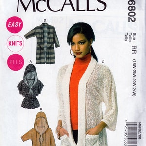 May include: A sewing pattern for a cardigan with a hood. The pattern is for sizes 18W-20W-22W-24W. The pattern is called McCall's M6802 and is for knit fabrics. The pattern is easy to sew and is for plus sizes.