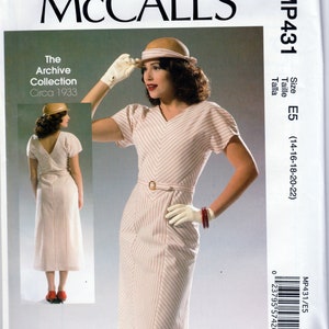 May include: Vintage sewing pattern for a dress from the McCall's Archive Collection, circa 1933. The pattern is for size E5 (14-16-18-20-22) and features a striped dress with a V-neckline and a belt.