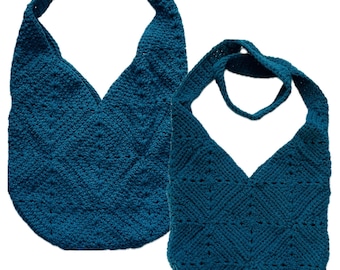 May include: Two teal crochet bags with a diamond pattern texture. Each bag features a single integrated shoulder strap and a V-shaped opening at the top. The bags are constructed from yarn with a consistent deep blue-green color throughout.