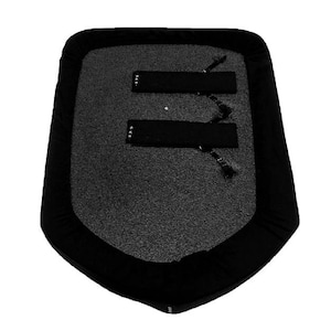 May include: A black shield with a gray, textured surface. The shield has two black straps with silver buckles.