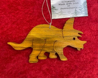 Hand-crafted wooden triceratops dinosaur ornament. Please see description for more information.