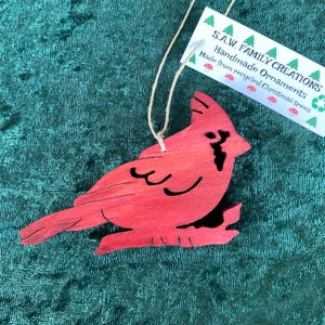 Hand-crafted wooden red cardinal ornament. Please see description for more information.