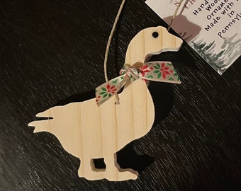 Hand-crafted wooden goose ornament. Please see description for more information.