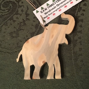 Hand-crafted wooden elephant ornament. Please see description for more information.