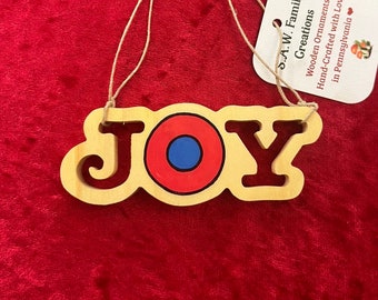 Hand-crafted wooden JOY ornament. Please see description for more information.