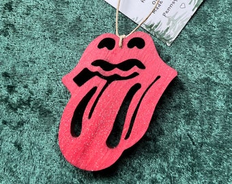 Hand-crafted wooden Stones tongue ornament. Please see description for more information.