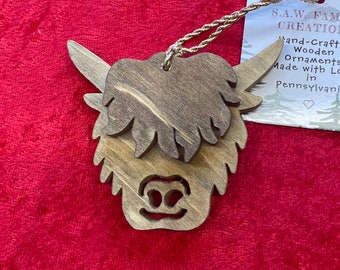 Hand-crafted wooden highland cow ornament. Please see description for more information.