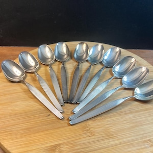 Set med 10 vintage Mid Century Modern Frigast Savoy matskedar Danmark EPNS från 1970-talets skandinaviska i original filthållare