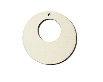 May include: A plain, unfinished wooden circle with a smaller circle cut out in the center. The circle has a small hole at the top for hanging.