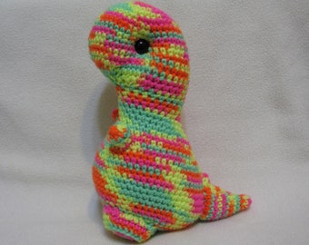 T-rex plush amigurumi - neon pink, orange, yellow, and green